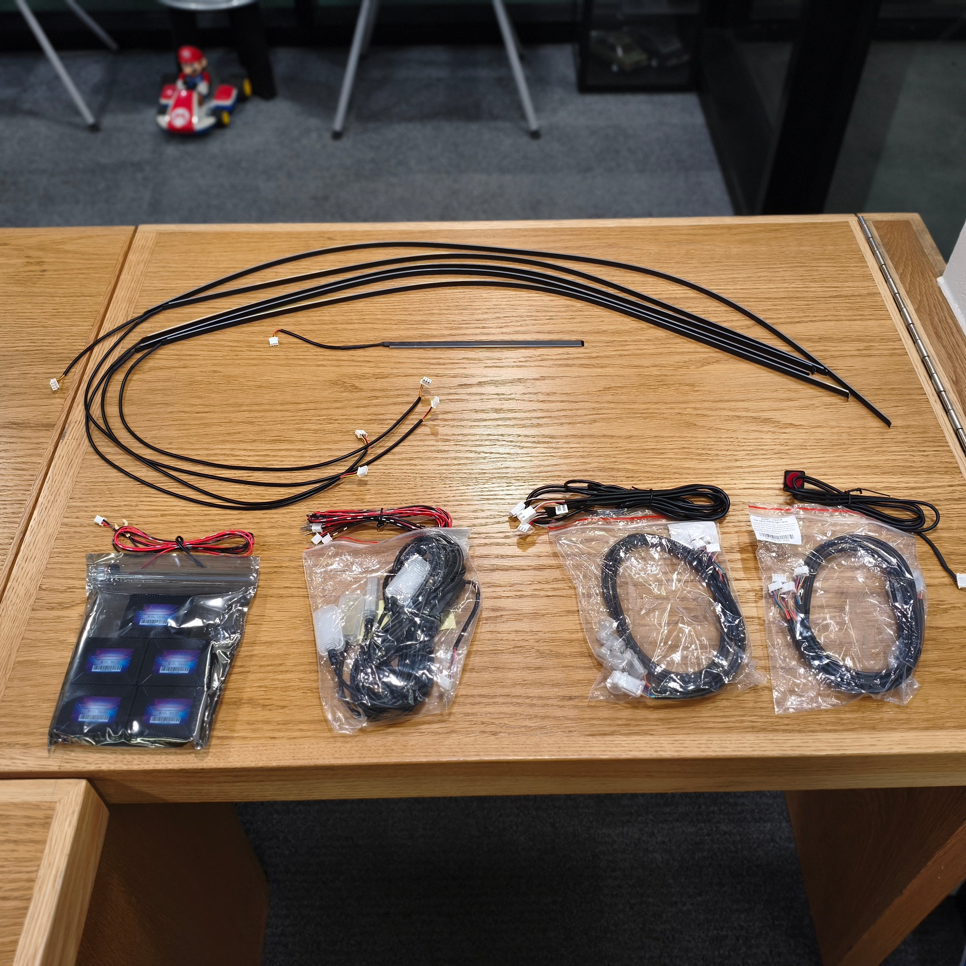 Set of ambient lighting and connectors on a wooden table