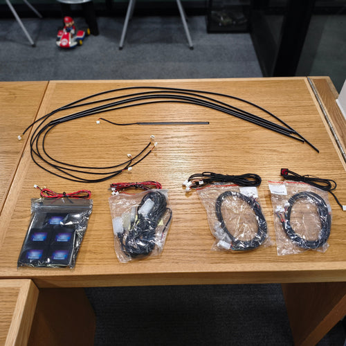 Set of ambient lighting and connectors on a wooden table